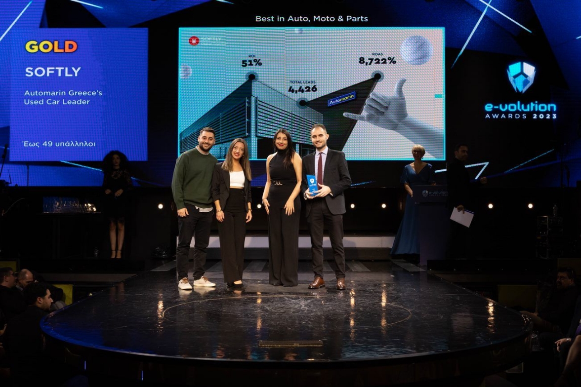 Softly team receiving the Gold e-volution award